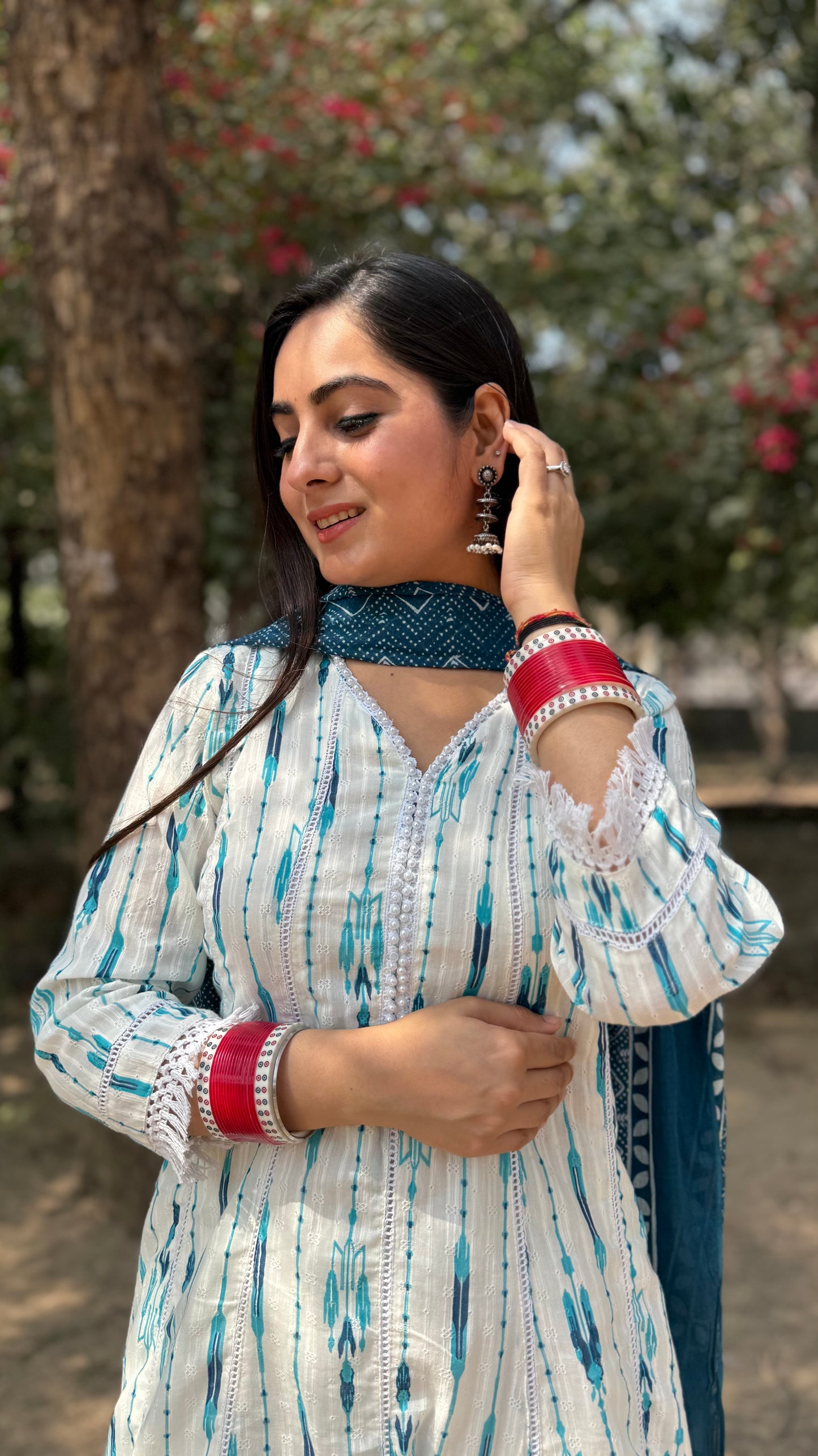 Nikita White Blue Anarkali Suit