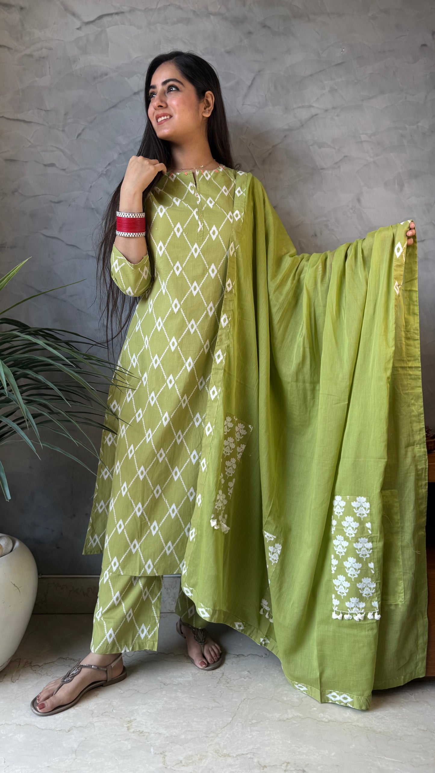 Kanika Pastel Green Printed Suit