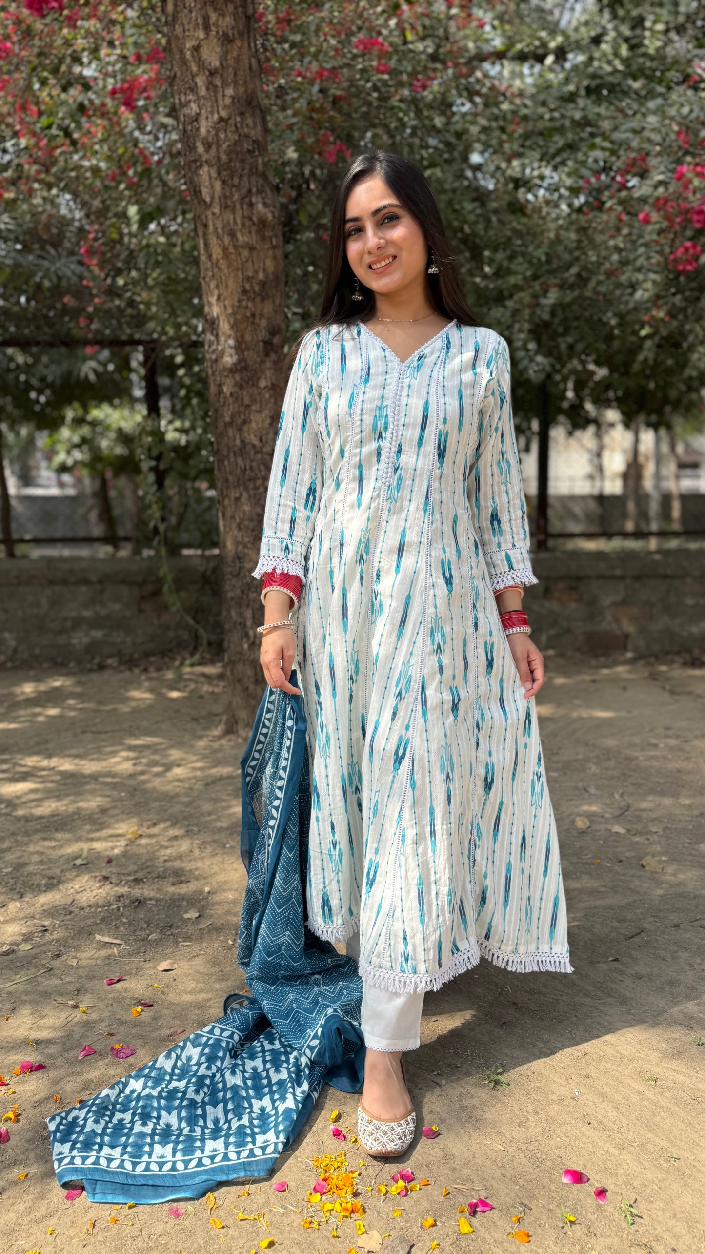 Nikita White Blue Anarkali Suit