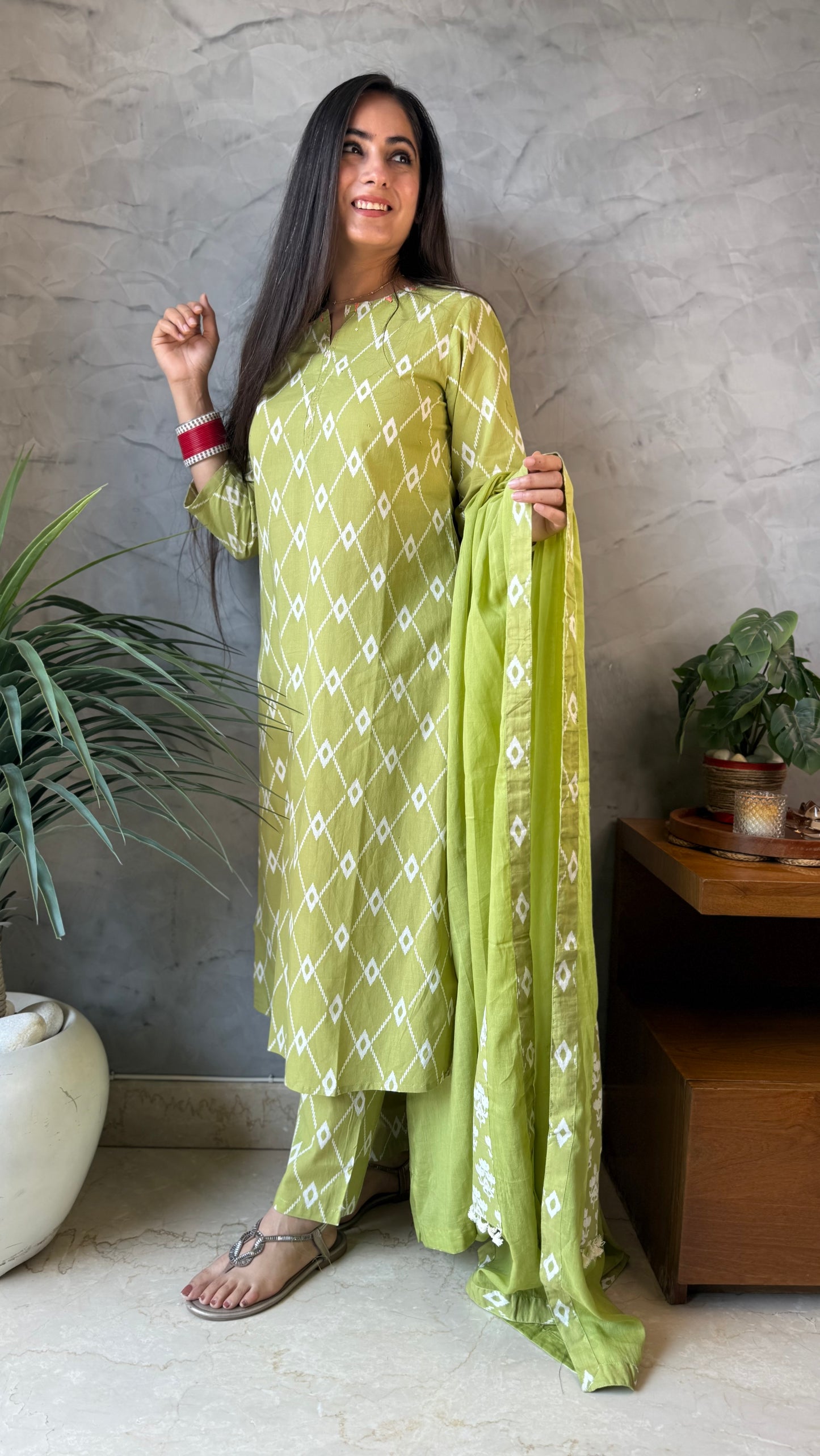 Kanika Pastel Green Printed Suit