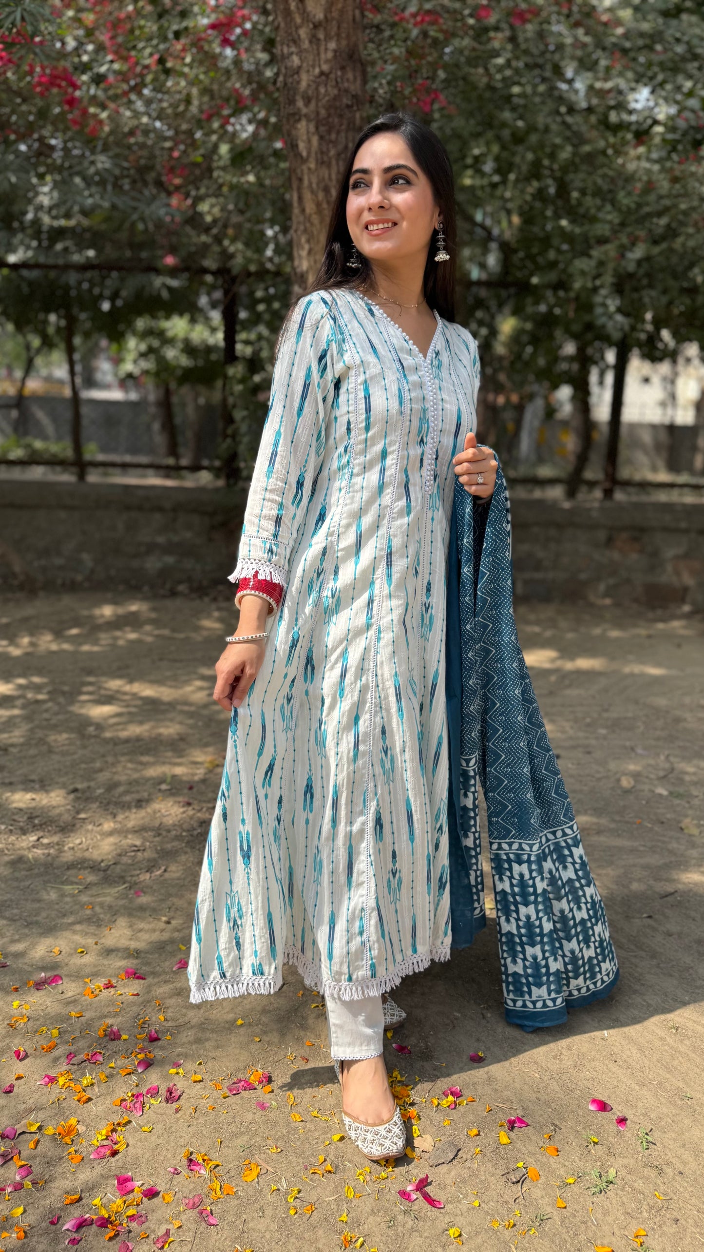 Nikita White Blue Anarkali Suit