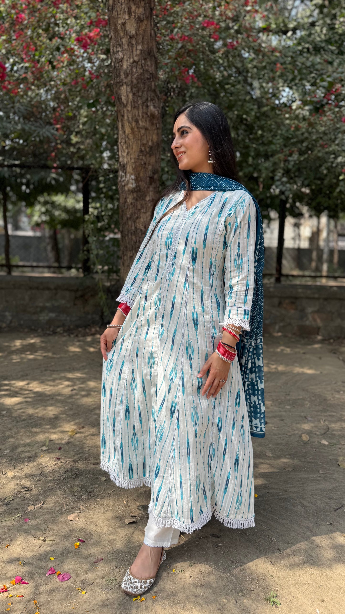Nikita White Blue Anarkali Suit