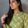 Kanika Pastel Green Printed Suit